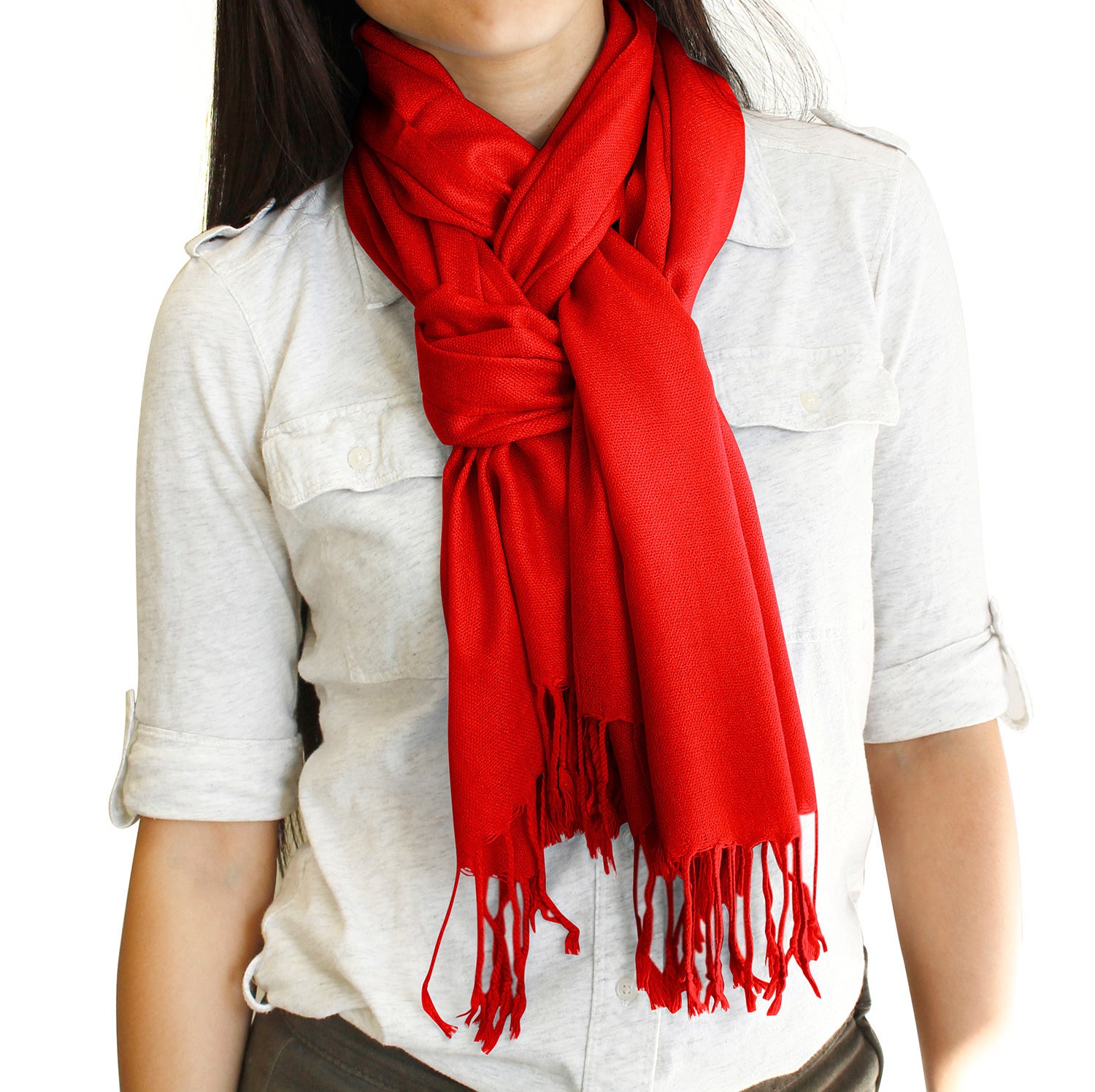 Model wearing a bright red scarf