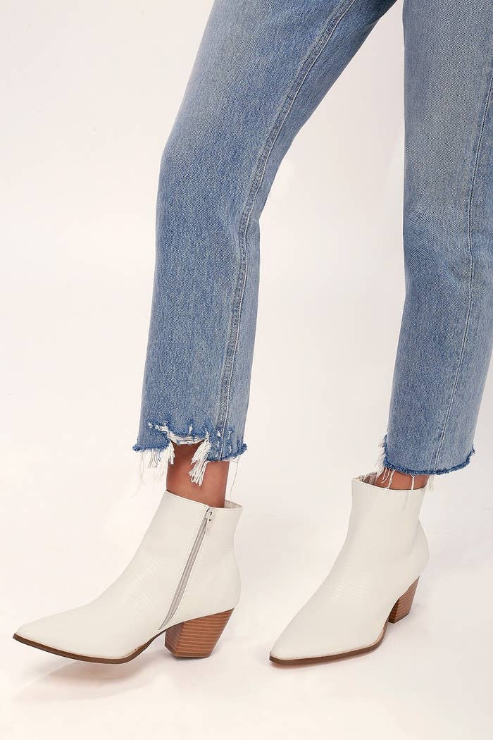 Lulus X Matisse white ankle booties with a snake print texture and pointed toe