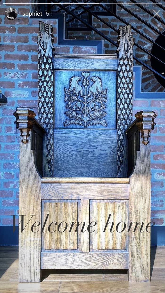 The Stark throne, decorated with direwolves, with the caption "Welcome home"