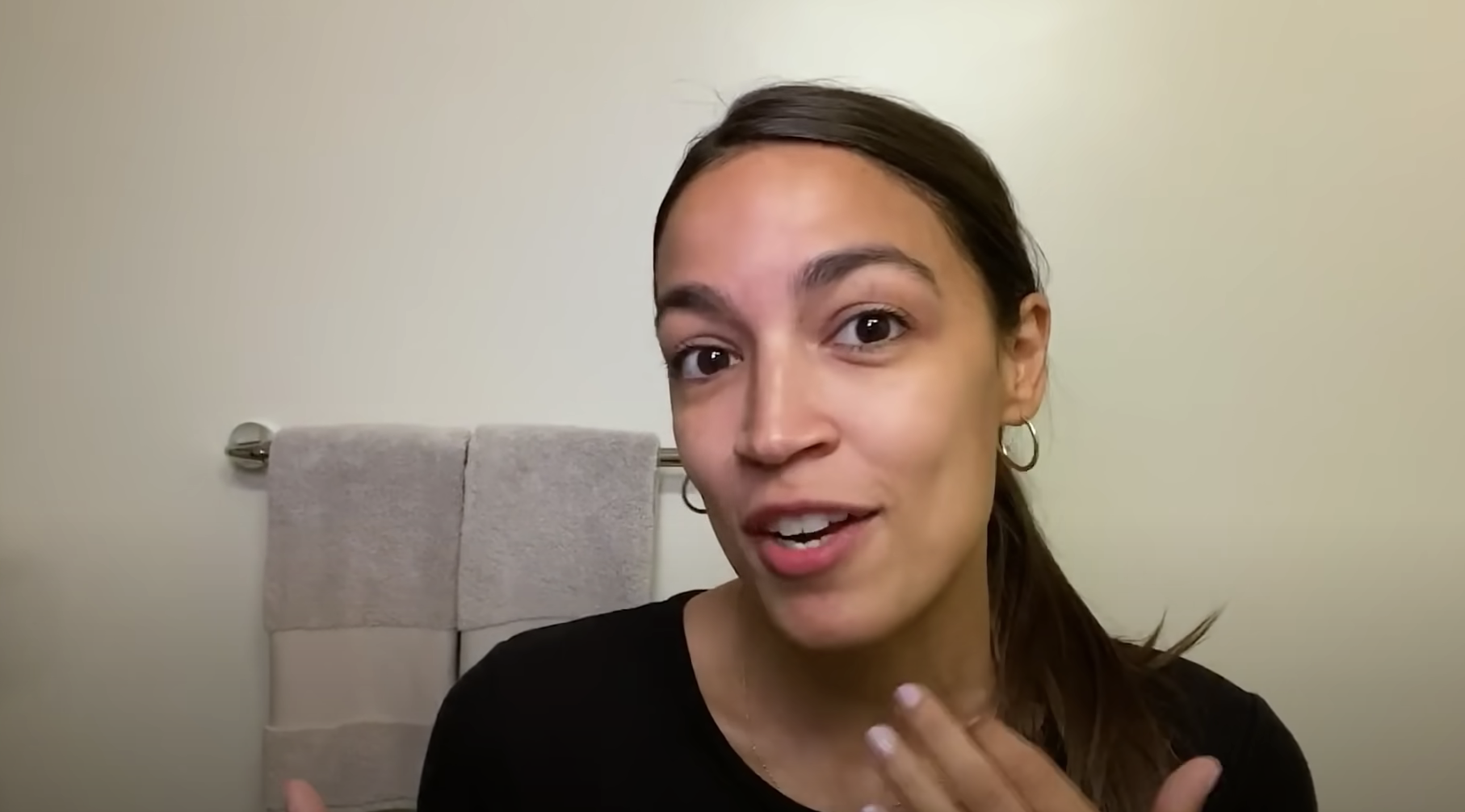 Alexandria Ocasio-Cortez talking to the camera.