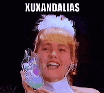 A GIF of Xuxa holding her jellies
