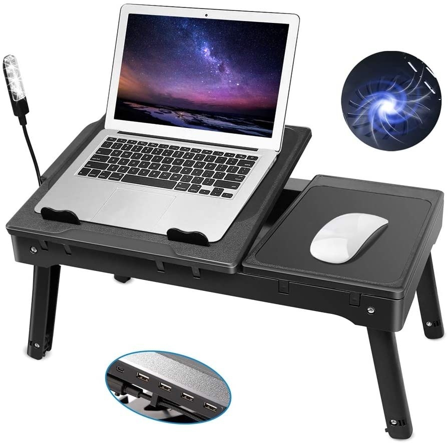 the black laptop desk tray  with a close-up of four USB ports