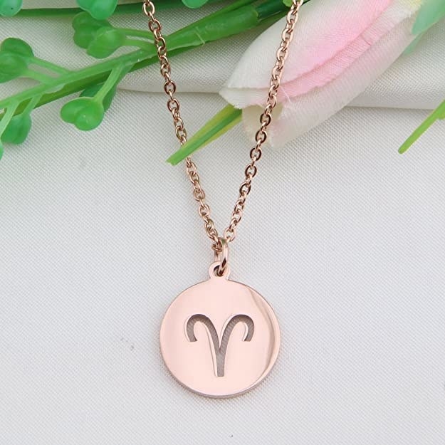 A necklace with the Aries star sign