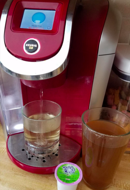 Reviewer photo showing the dirty liquid coming out of their Keurig while using a Quick &amp;amp; Clean cleaning pod 
