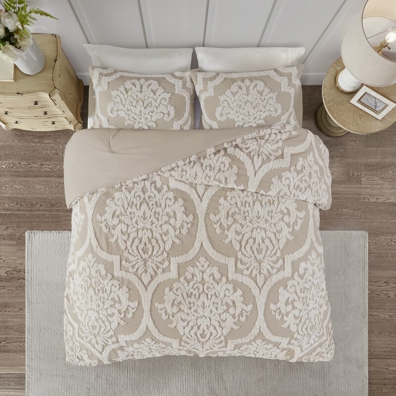 Elder & Ivory's chenille comforter set with a taupe color and lighter beige damask design