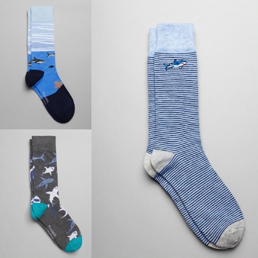 Three pairs of mid-calf socks featuring shark designs