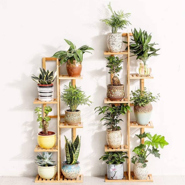 Bamboo stand with five tiers and room for six potted plants