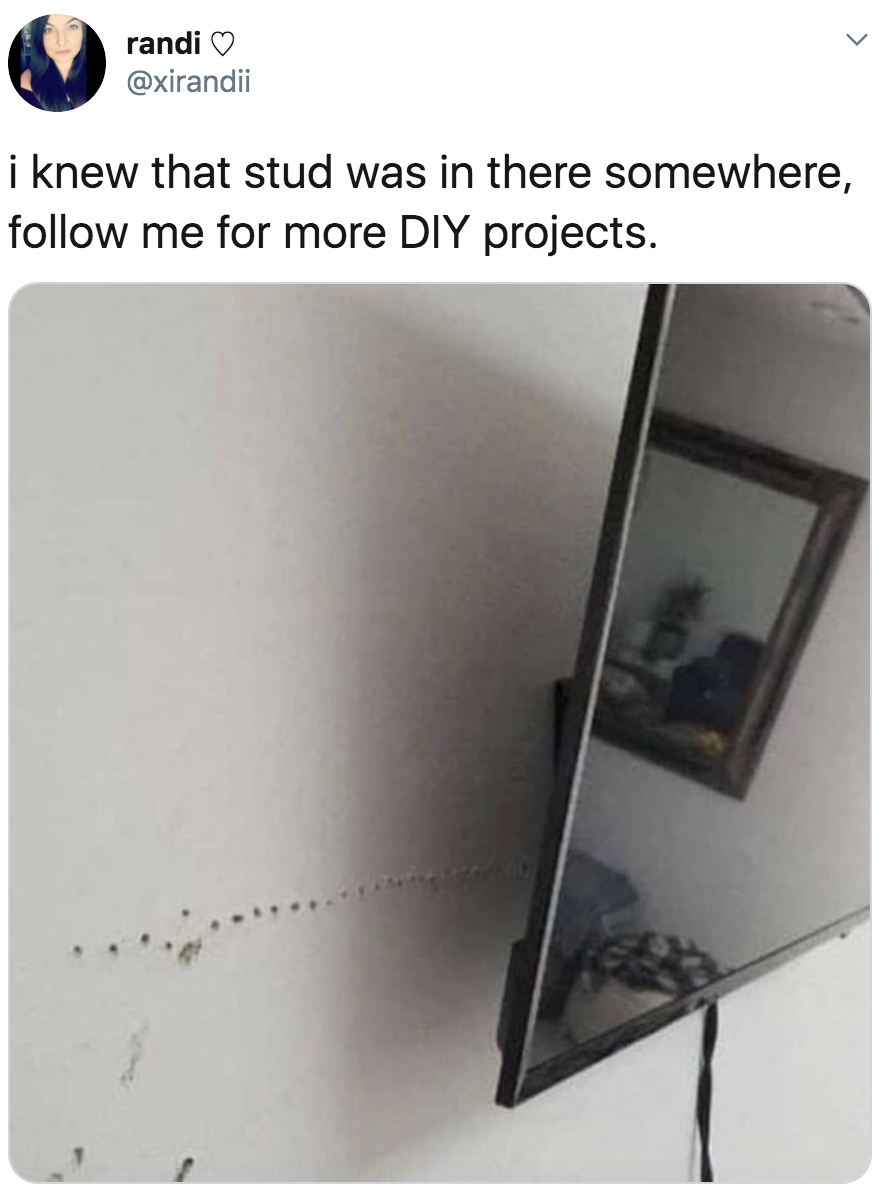 many holes in a wall looking for a stud