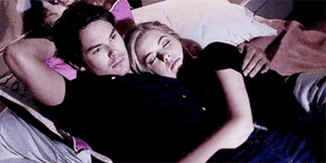 Hanna sleeping next to Caleb