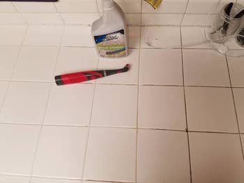 Reviewer's tile floor with half dirty grout, and the other half totally clean 