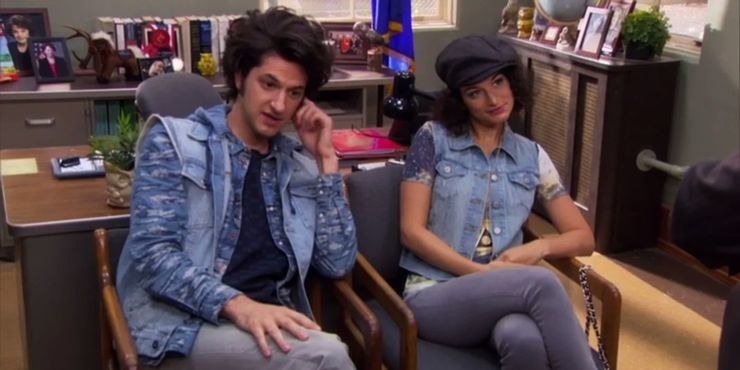 Jean Ralphio and Mona Lisa sitting in Ron&#x27;s office in matching denim outfits in &quot;Parks &amp;amp; Rec.&quot;