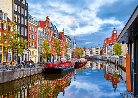 Amstel river with colourful houses either side