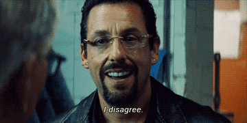 gif of Adam Sandler in uncut gems saying &quot;I disagree&quot; as he grins and walks away