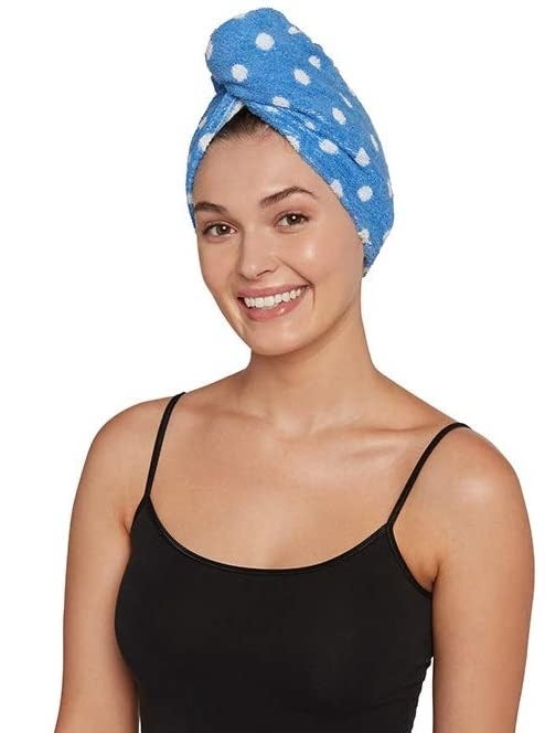 person wearing the turbie twist on head while wearing clothes