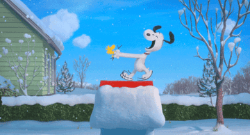Snoopy and Woodstock dancing on the doghouse in Peanuts 