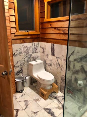The bamboo squatty potty in a customer's bathroom