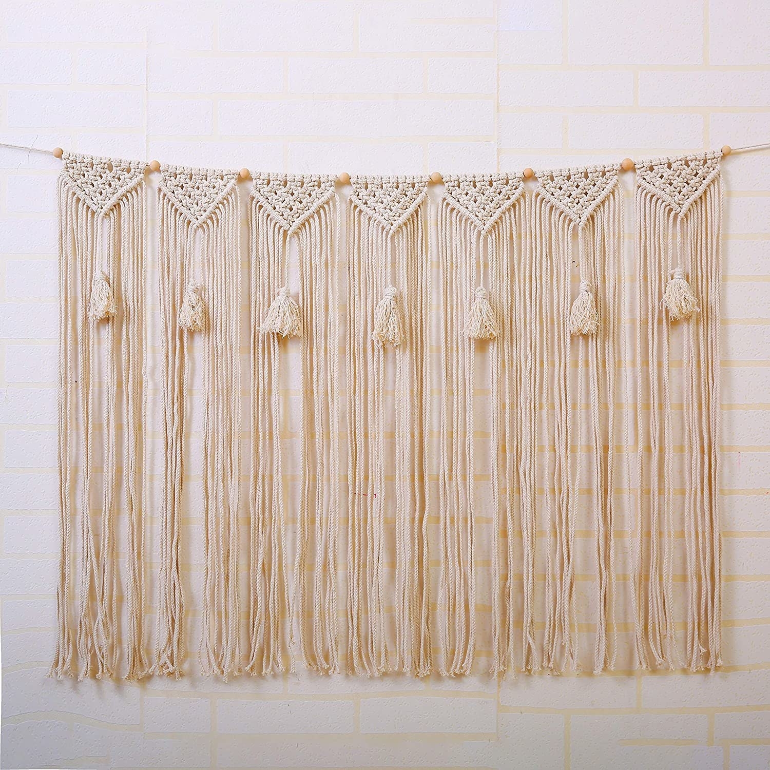 Natural rope macramé wall hanging with tassels