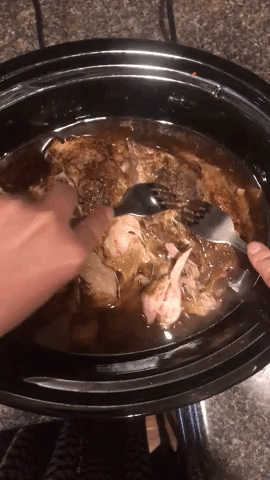 A gif of Rachel Dunkel cutting into meat made in the Crock-Pot