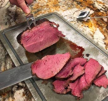 A reviewer showing that their meat cooked using the sous vide came out at a perfect medium 