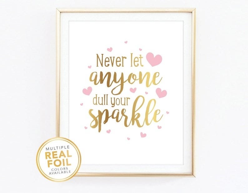 A print says never let anyone dull your sparkle in gold foil with hearts