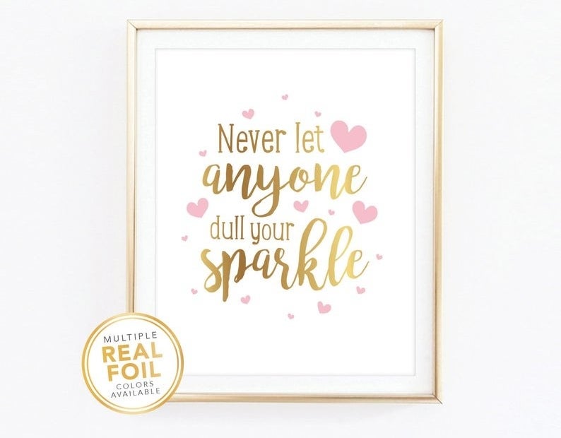 A print says never let anyone dull your sparkle in gold foil with hearts