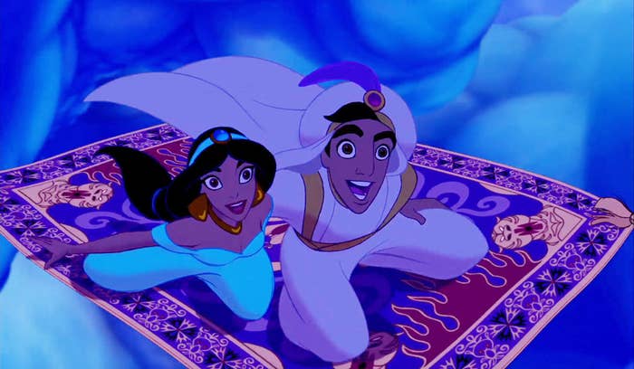 A screenshot of Princess Jasmine and Aladdin (as Prince Ali) flying on carpet through the sky during the &quot;A Whole New World&quot; scene