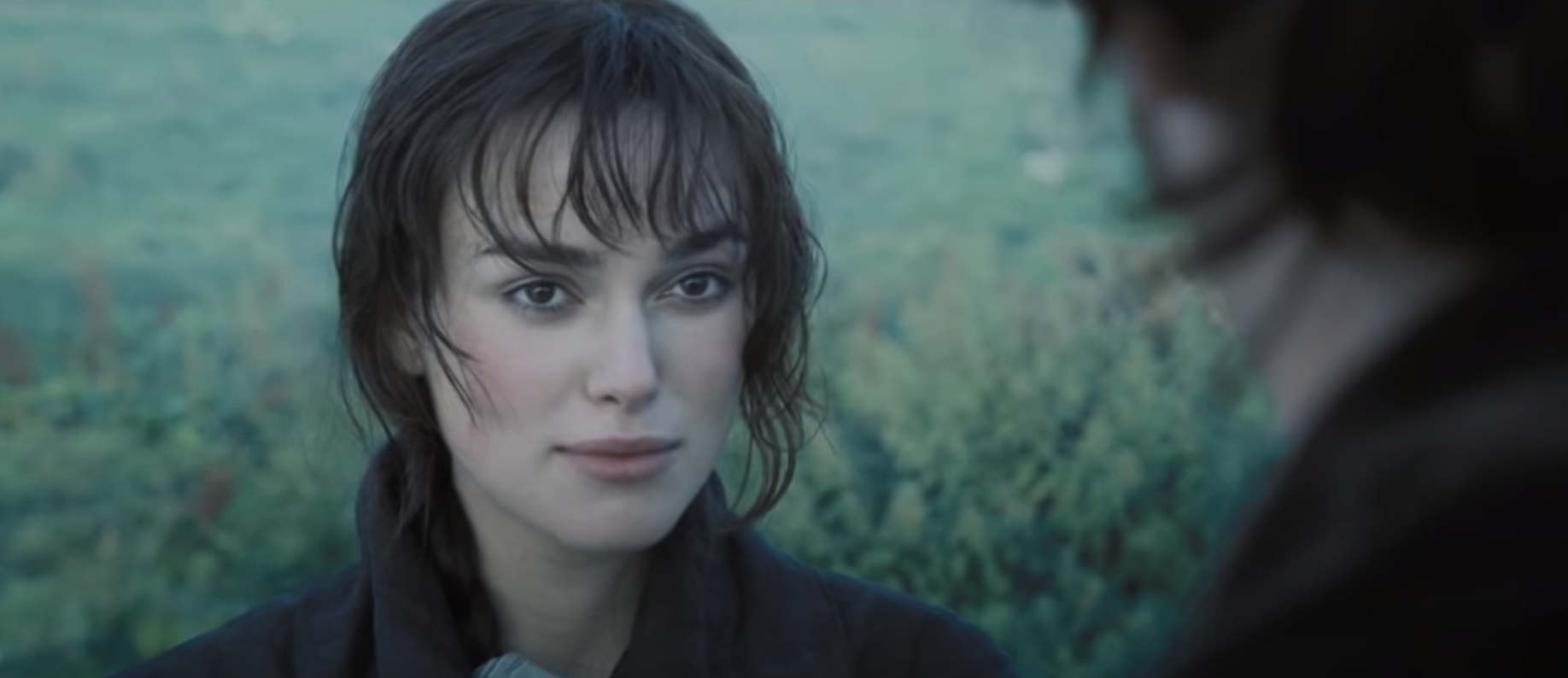 Elizabeth looks at Mr. Darcy as he confesses his love for her in &quot;Pride and Prejudice.&quot;
