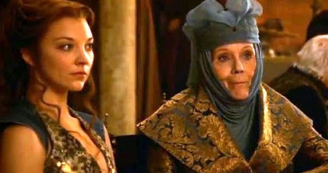 Margaery and Olenna sitting at the dinner table in &quot;Game of Thrones.&quot; 