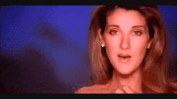A GIF of Celine Dion singing &quot;My Heart Will Go On&quot; in the music video for it