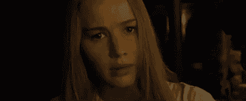 Jennifer Lawrence looking scared as a wall crumbles in &quot;Mother!&quot;