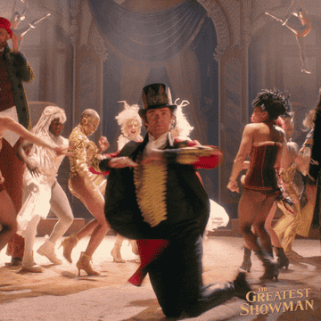 P.T. Barnum dances with his circus.