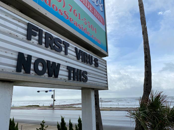A sign says "First virus, now this"