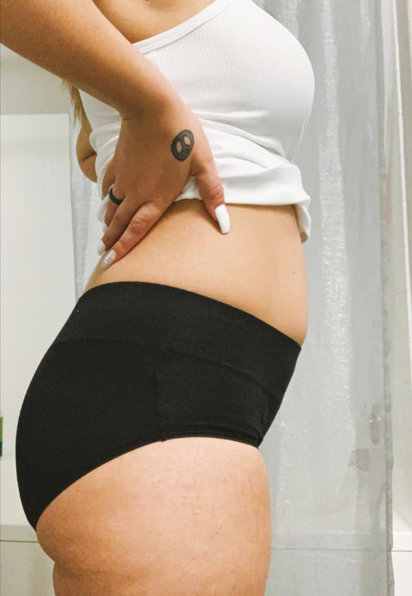 A reviewer in black underwear 