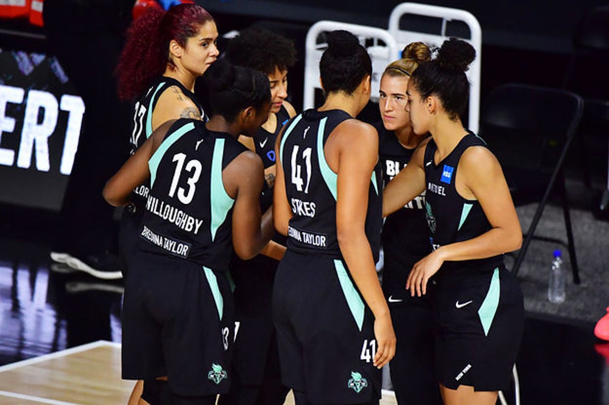 WNBA players walk off court before national anthem in WNBA season opener 