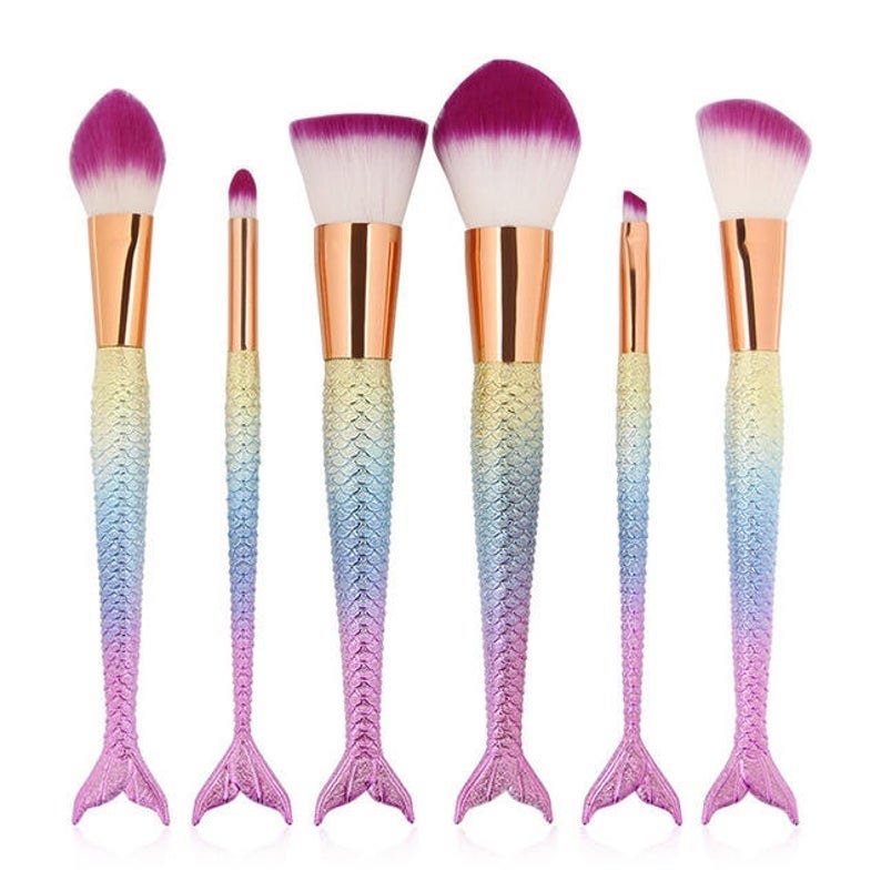 Multi colour makeup brushes with mermaid tials