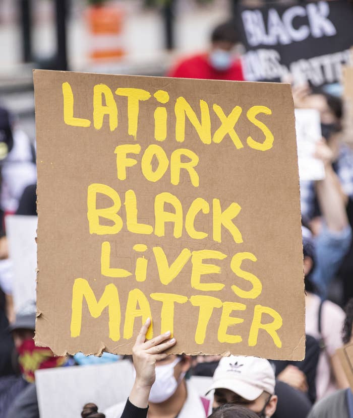 A protest sign that says, &quot;Latinxs for Black Lives Matter&quot;