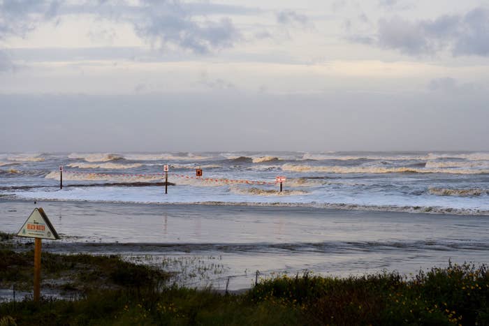 High surf from Hurricane Laura covers a jetty in Galveston, Texas