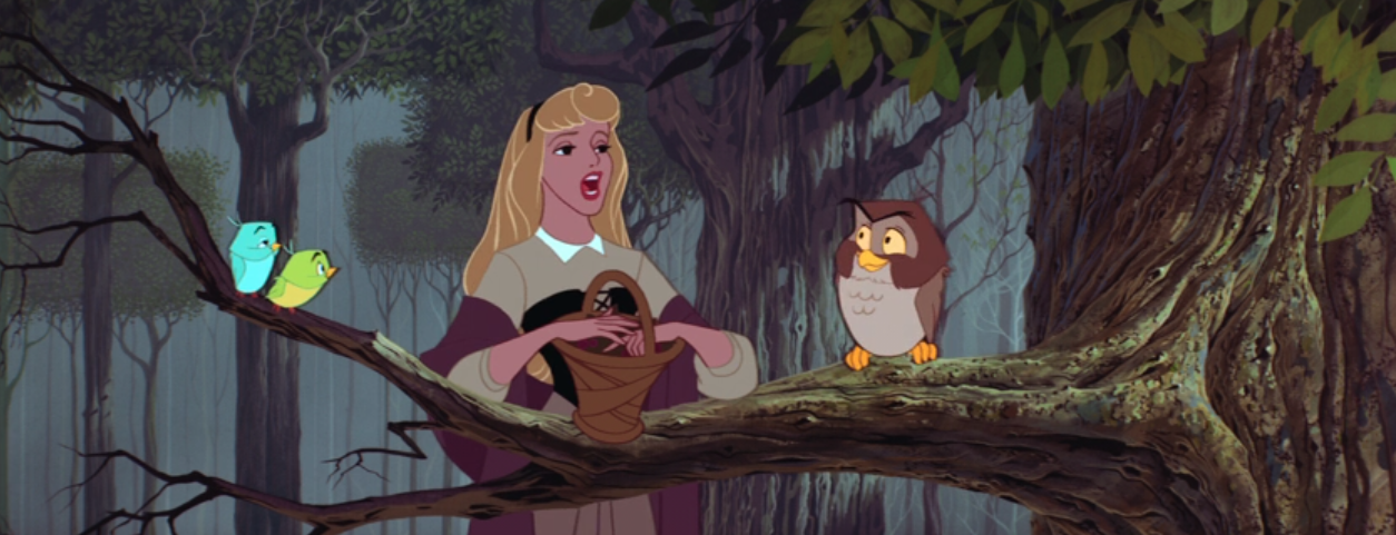 Aurora singing to birds on a branch in the forest during &quot;Sleeping Beauty&quot;