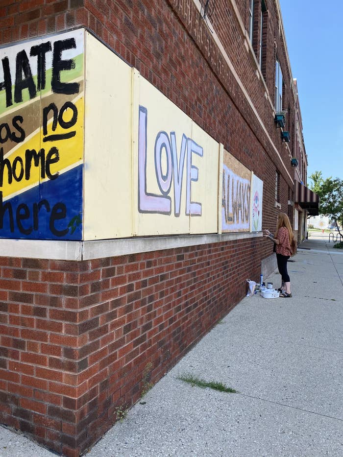 Murals say &quot;hate has no home here&quot; and &quot;Love&quot;