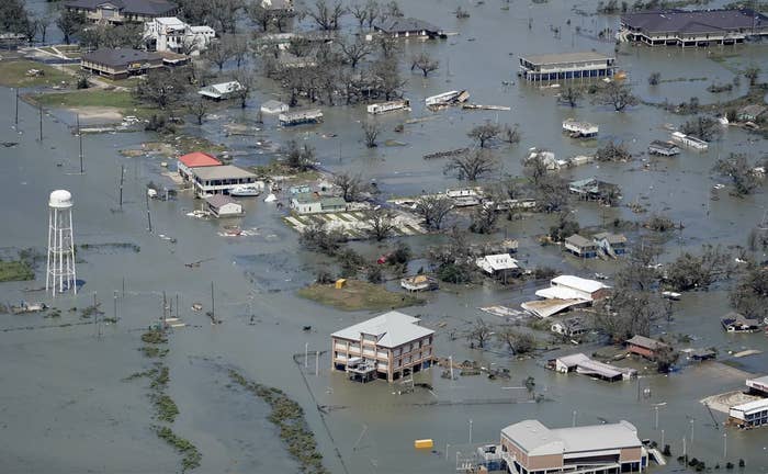 An aerial shot shows the town of Lake Charles submerged in water