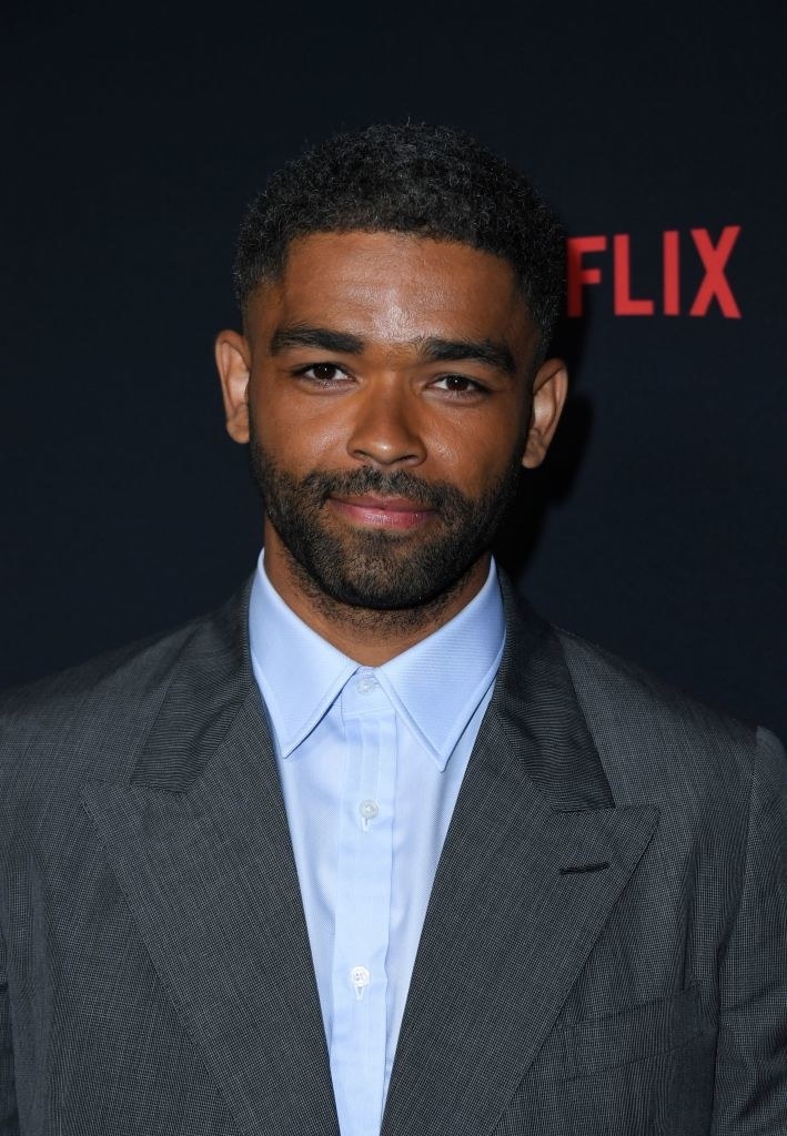 Kingsley Ben-Adir wearing a suit and button-up shirt at a Hollywood event