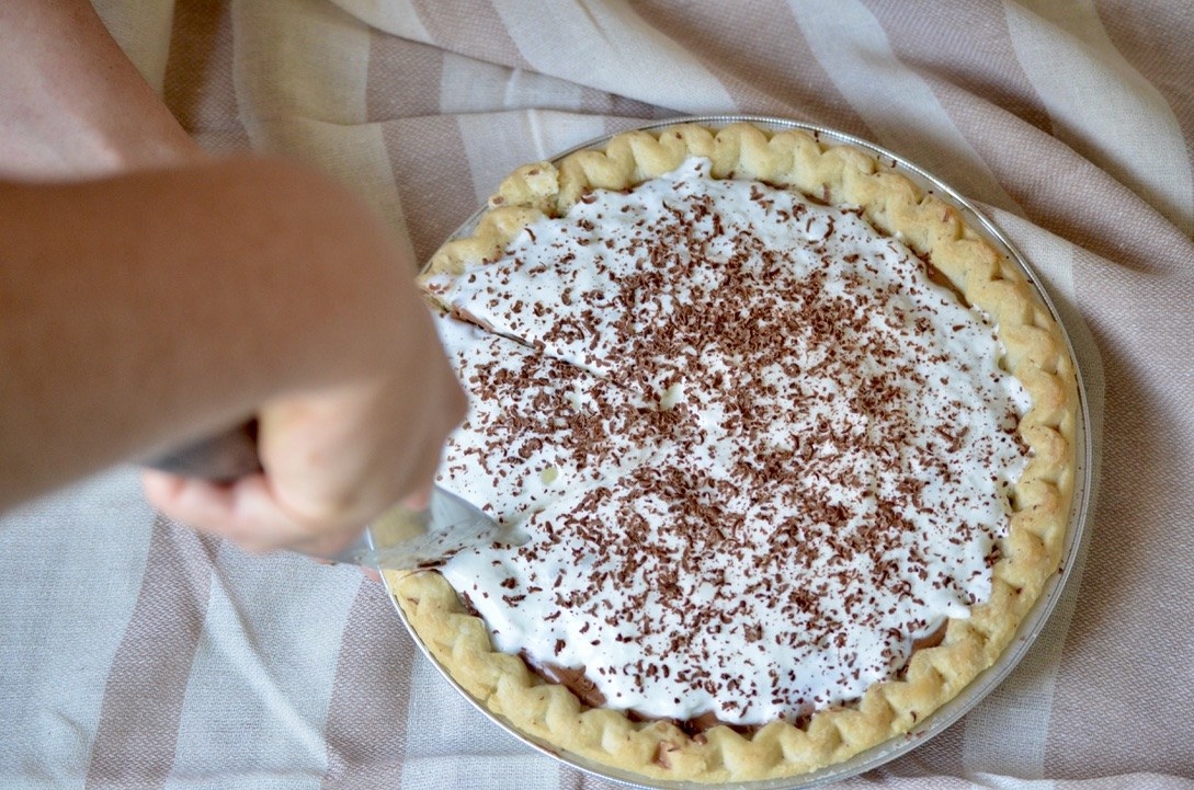 The author cutting into the storebought version of the French Silk Pie