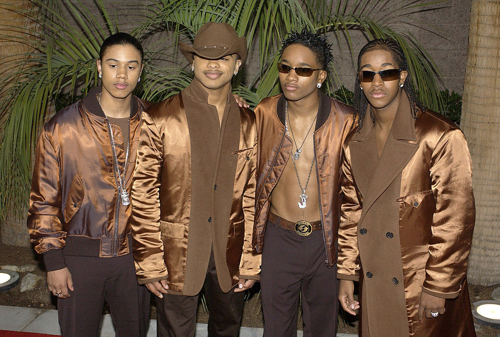 B2K in different brown outfits that all kind of match