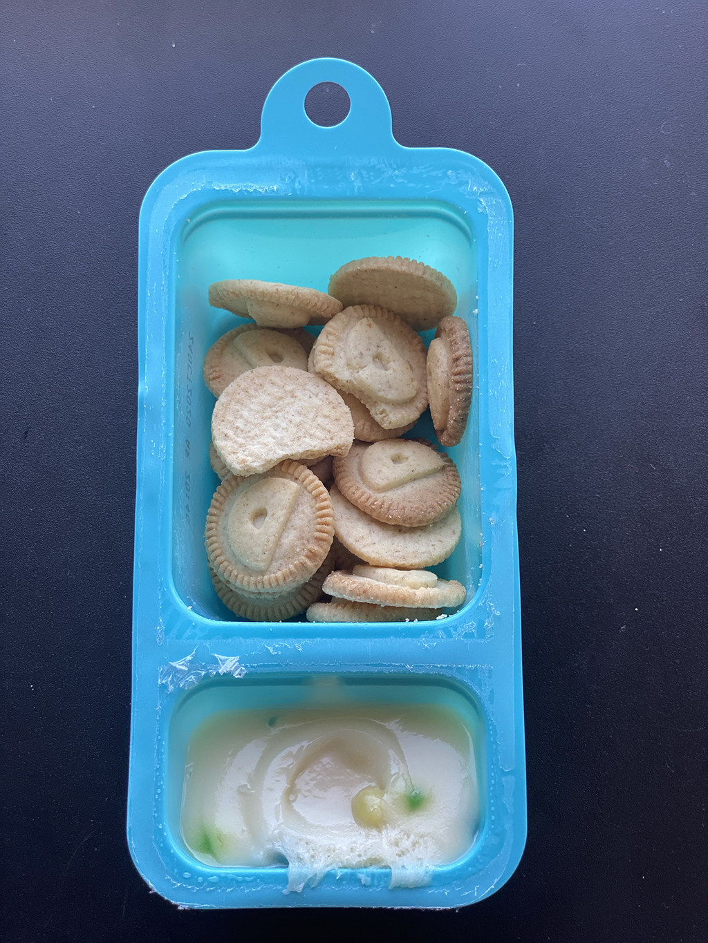 An opened package of DunkAroos cookies and frosting