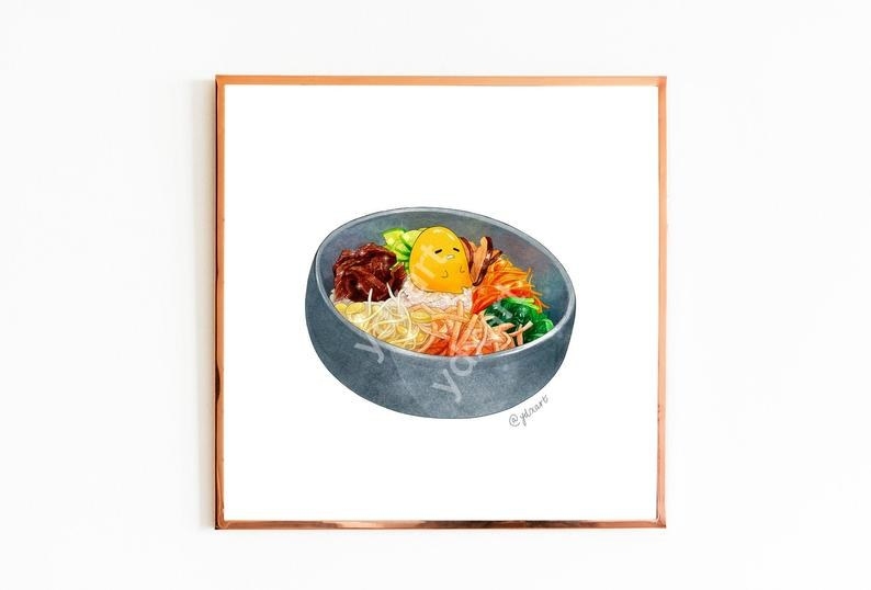 An art print of Gudetama in a bowl of food