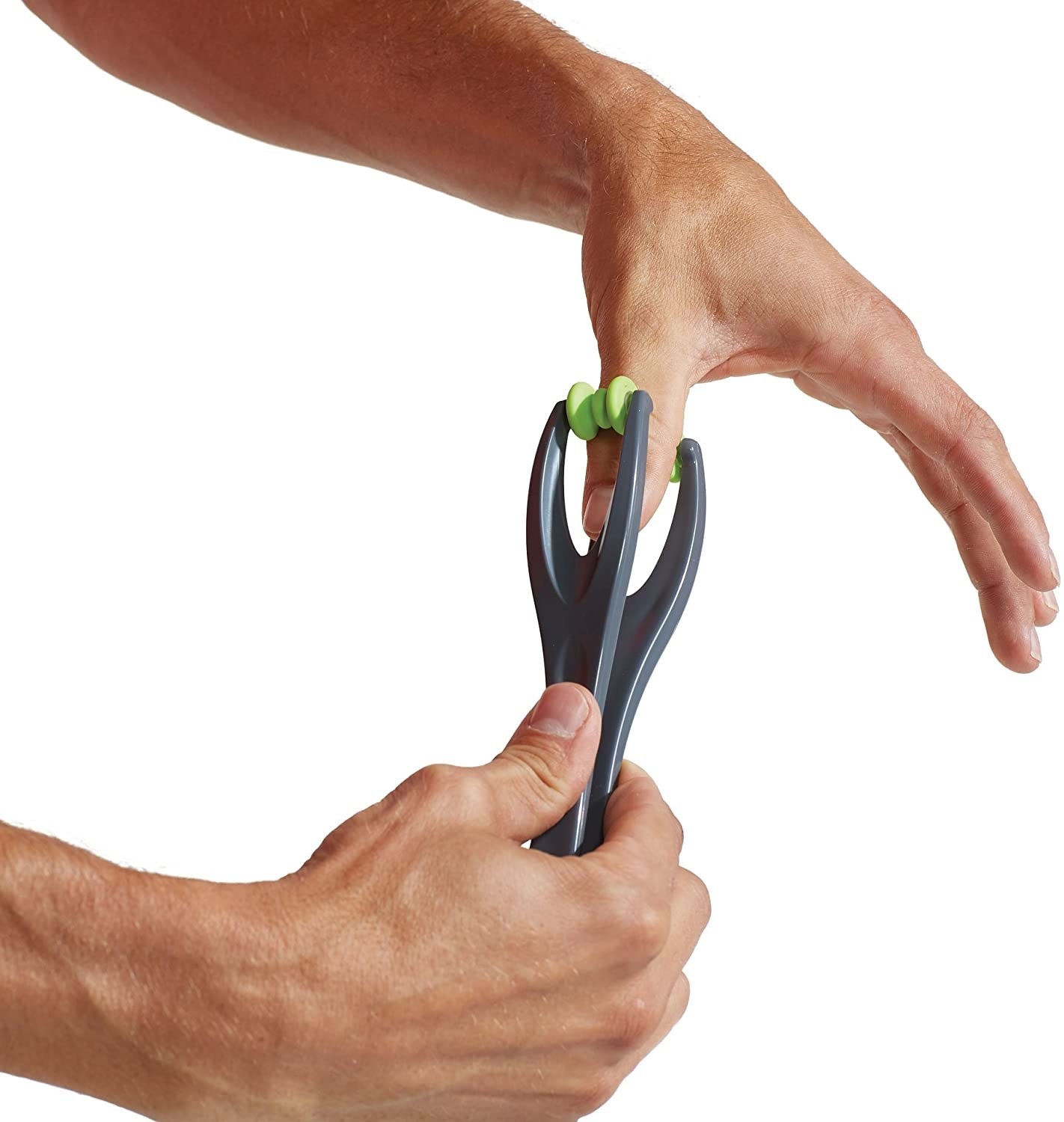 A close up of a person using the finger massage on their thumb