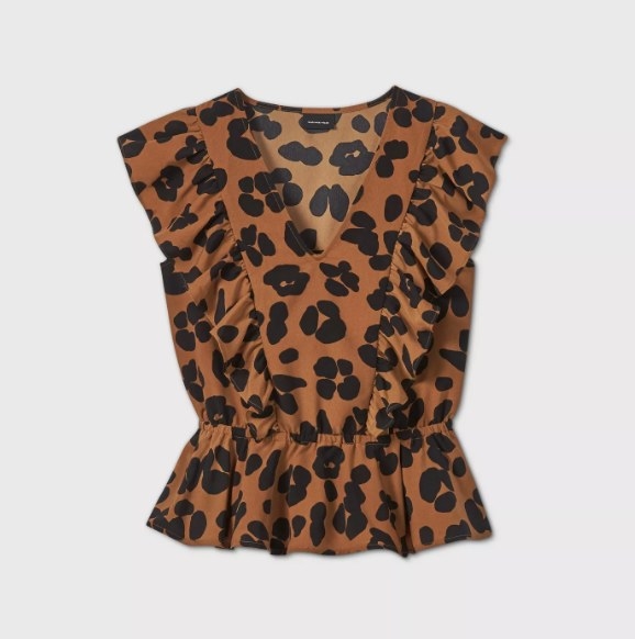 The cheetah print sleeveless blouse