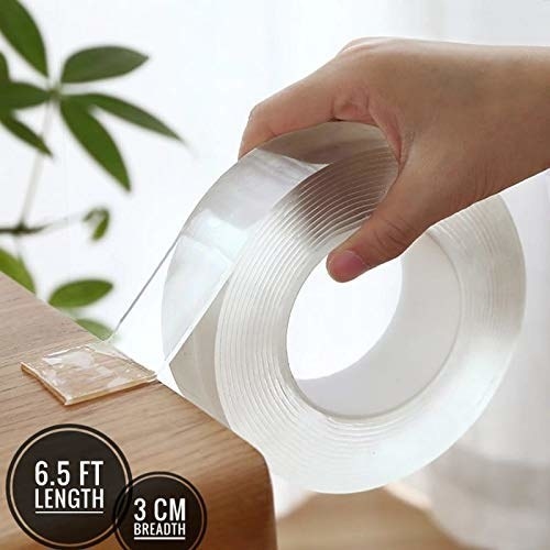 Double sided clear tape.
