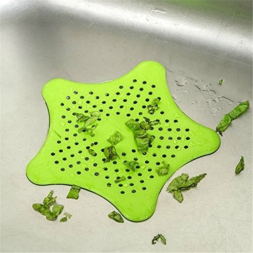 Green star shaped sink hair catcher.