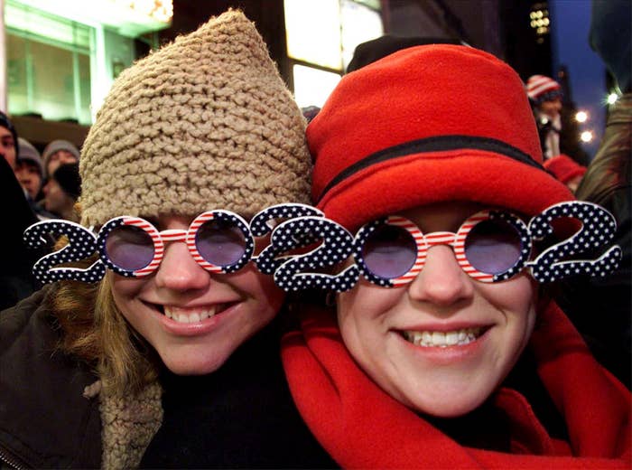 People wearing 2002 glasses in Times Square